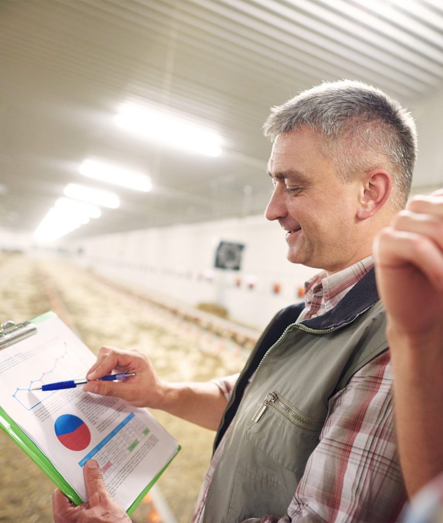 renewable energy accountant showing a chart to his client