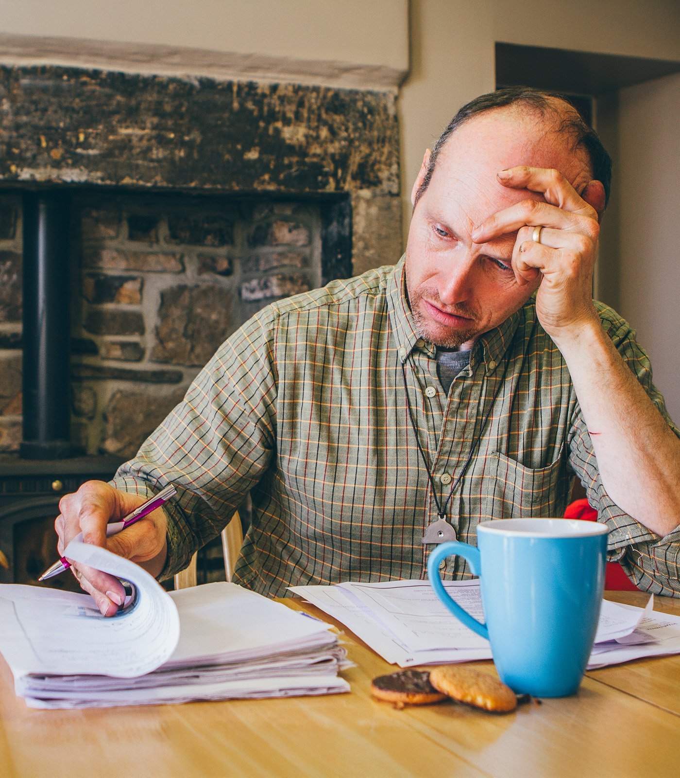 A farm owner reviewing a poorly worded solar farm contract