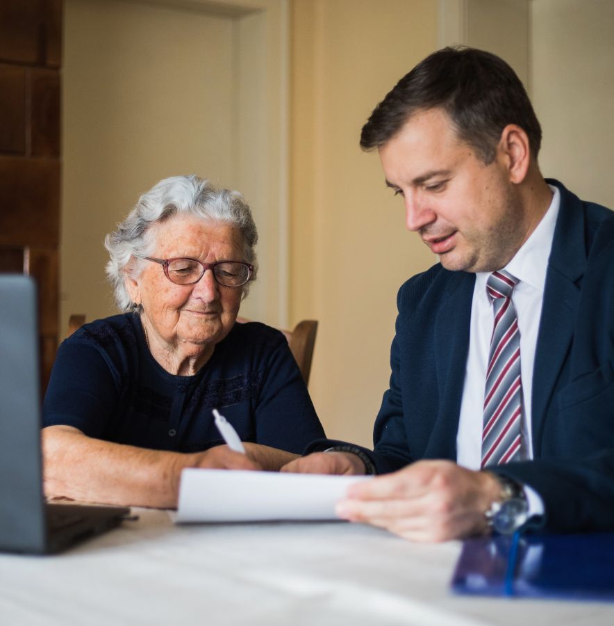 A lawyer discussing the will to the widow